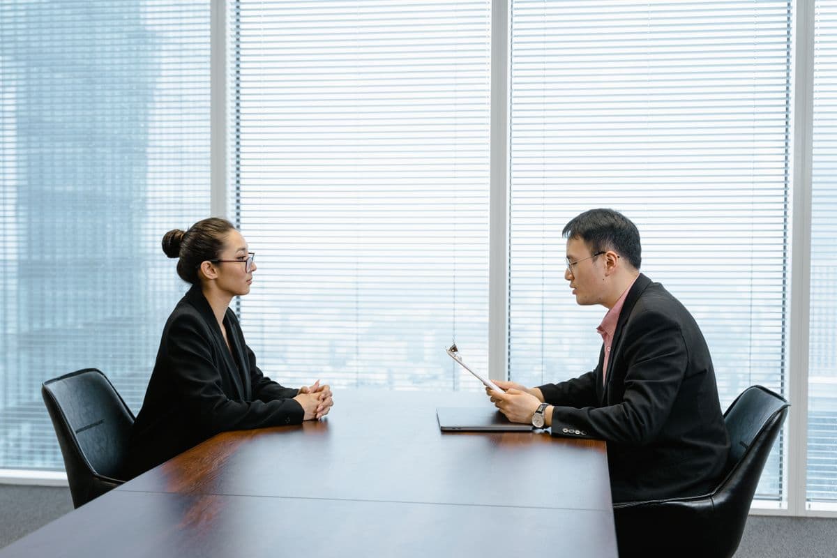 A recruiting team reviewing candidates together